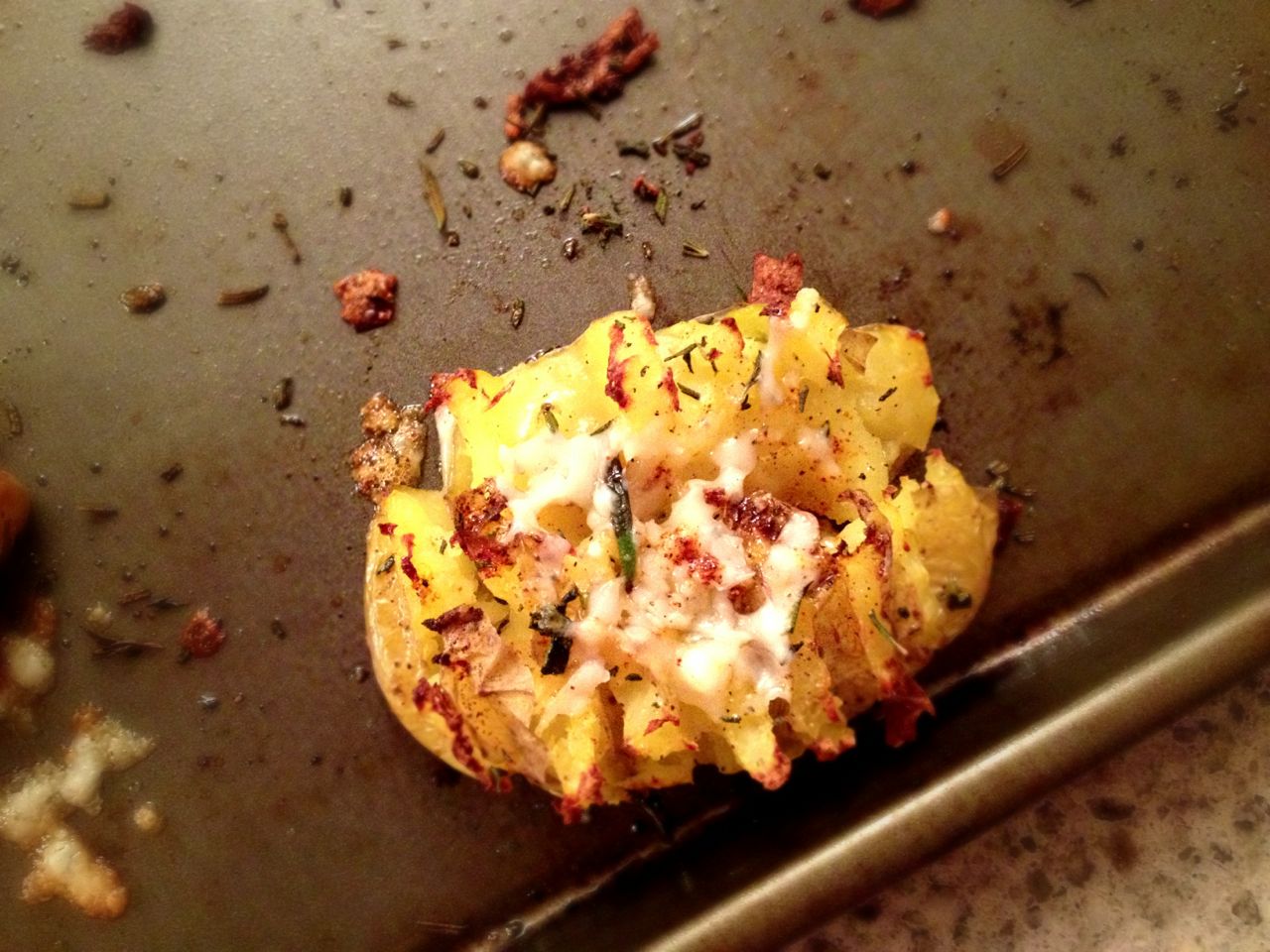 Smashed roasted potatoes with Manchego